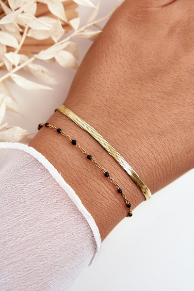 Doppeltes Schlangenarmband und anker Gold