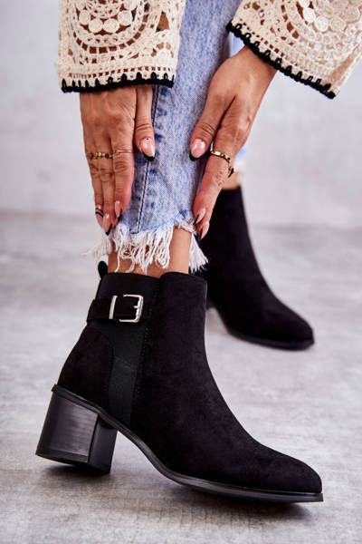 Suede boots on a post Black Vannes