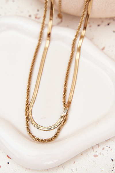 Double chain of surgical steel golden