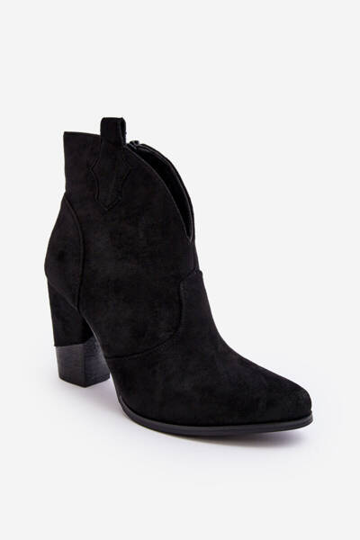 Cizme de cowboy din piele pe un bronz negru