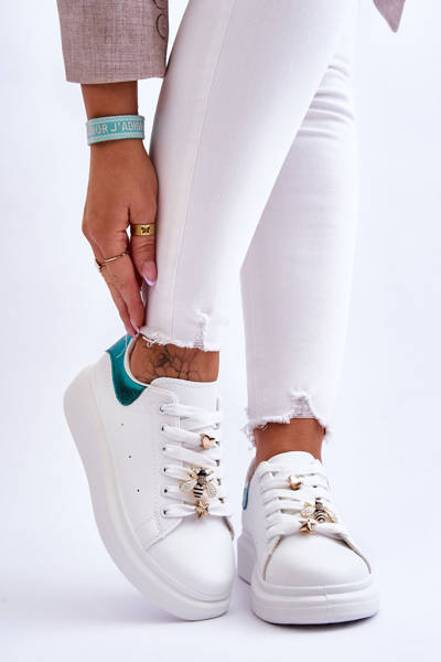 Chaussures De Sport Pour Femmes Sur Une Plateforme Massive Blanche Et Verte Chante