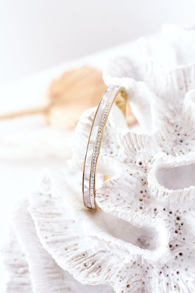 Bracelet en acier avec zircons cubiques et or perlé