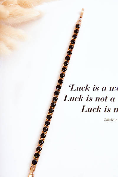 O brățară elegantă cu un fermoar în negru și auriu