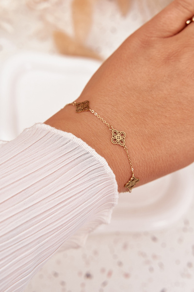 Bracelet en acier inoxydable avec pendentifs en or