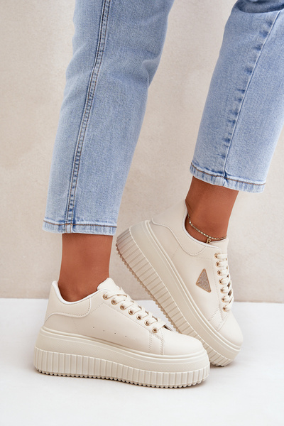 Stylische Sneaker auf einer massiven Plattform hellbeige Vallexia