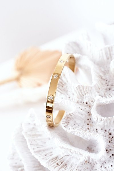 Bracelet en acier avec gros zircons cubiques dorés