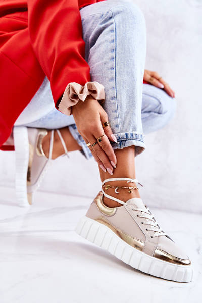 Damen-Brogues auf der beige-goldenen Noriso-Plattform