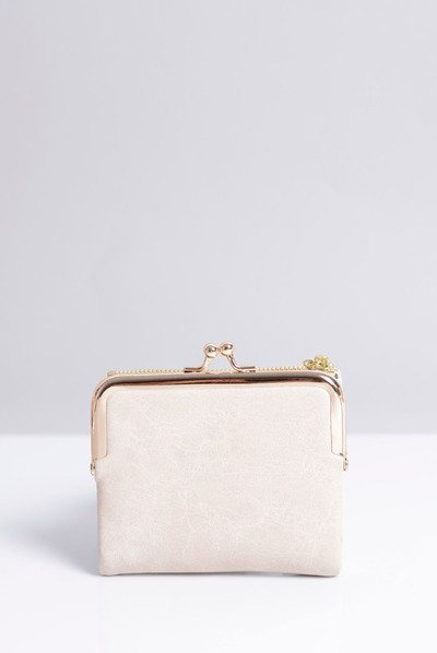 Kleine beigefarbene Damenhandtasche